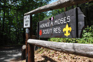 A large wooden sign hangs by the entrance of the Horace Moses Scout Reservation in Russell. (File photo by chief photographer Frederick Gore)