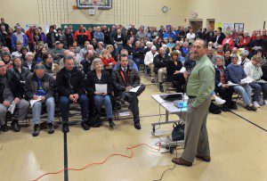 Westfield City Engineer Mark Cressotti, right, answers questions during a slide presentation at an informational meeting on proposed roadway improvement projects along Western Avenue and Court Street. More than 200 residents attended the meeting at Highland Elementary School. (File photo by Frederick Gore)