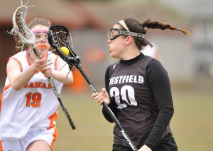 Victoria Whalen, right, carries the ball for Westfield. (File photo by chief photographer Frederick Gore)