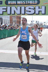 Westfield's Andrew Messer finishes the Run Westfield 5K run with a time of 15:20 to claim the 16th spot in his age class. (Photo by chief photographer Frederick Gore)