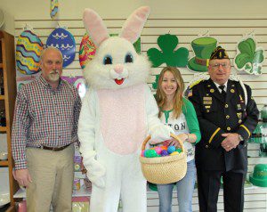 Once again, American Legion Post 124 will hook up with the Easter Bunny bringing greetings and candy-filled eggs to people in area hospitals and nursing homes .Greg Jerome, owner of Party Plus on Union Street, poses with the Easter Rabbit as Jasmin Keeley looks on with the Commander of Post 124, Edward Johnson.  (Photo by Don Wielgus)   