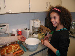 Gateway fifth-grader Kiara Markewicz, about to crack eggs as she prepares French toast during the “Healthy Cooking, Healthy Eating” after-school class, funded by the Gateway Education Foundation.  (Photo submitted)