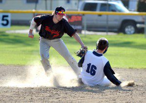 Westfield's Tim Donahue, left, records the out on a Pittsfield runner at second base. (Photo by Frederick Gore)