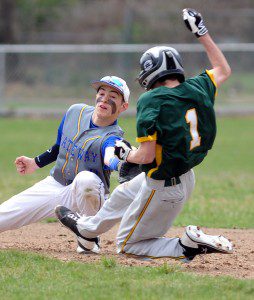 Gateway second baseman Willis Pollard, left, attempts the tag on Southwick's Andrew Mitchell. Pollard lost the ball on the play and Mitchell was declared safe. (Photo by Frederick Gore)