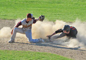 Westfield's Chris Sullivan, right, beats the tag of Chicopee second baseman Nick Asselin during Tuesday's game at Bullens Field. (Photo by Frederick Gore)
