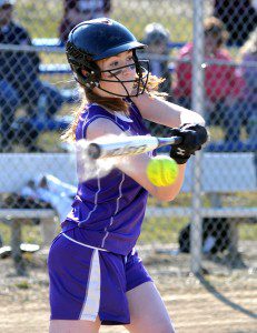 Voc-Tech batter Stephanie Allen drives the ball for a base hit during the bottom of the first inning Friday at Whitney Field. (Photo by Frederick Gore)