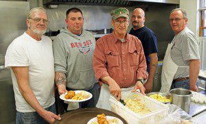 This past Friday, American Legion Post 124 held their annual Good Friday Fish Dinner. With a record crowd, the money raised will benefit many of the sporting events sponsored by the Post each year.  Left to right, the kitchen crew, Capt. Bill Bush, Dave Rose, Bruce Orlandi, Bill Bush, Jr. ,Tom Miller.  (Photo by Don Wielgus)  
