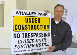Southwick Department of Public Works Director Jeff Neece holds the sign that will be installed next week at Whalley Park. A member of the Southwick Park and Recreation will install the sign. (Photo by Frederick Gore)