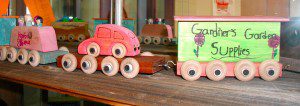 Some of the wooden trains built and decorated by third grade students.  (Photo submitted)