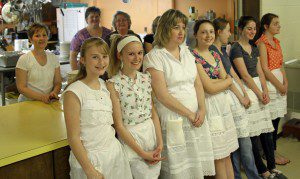 Young ladies wait to serve the meal. (Photo submitted)