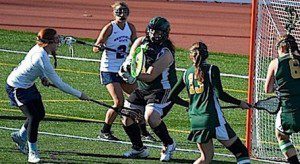 Maura Stack goes low to score one of her four goals. (Photo by Mickey Curtis)
