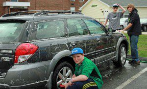 The past Saturday, a benefit car wash was held by the students from St. Mary's Church and St. John's Lutheran Church. The money was raised for the West of the River Chapter of Pioneer Valley Massachusetts Citizens for Life  Left to right, Mark Butler, Austin Cressotti and Jacob M. Butler.  (Photo by Don Wielgus)