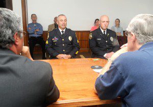 Westfield Police commissioners Felix Otero, Karl Hupfer and (unseen) Leonard Osowski listen as they interview acting Sgt. Jeffrey Baillargeon and Officer Michael T. Kane for positions as permanent sergeants in the department. (Photo by Carl E. Hartdegen)