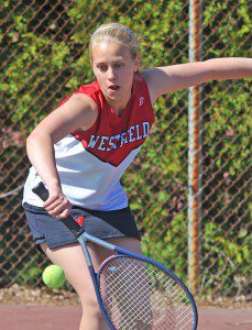 Westfield's second doubles Olga Korobkov competes in yesterday's match against visiting Cathedral. (Photo by Frederick Gore)