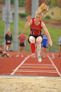Westfield's Emily Ann Andrews competes in the long jump during Thursday meet in West Springfield. (Photo by Frederick Gore)