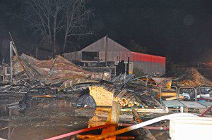 A large industrial type building was destroyed last night near the rear of 100 Apremont Way where the Western Mass Truss Company is located. The fire consumed the structure and caused numerous smaller fires in the immediate area. The multi-alarm blaze brought in fire apparatus from several surrounding towns. (Photo by Frederick Gore)