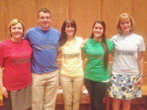Denise Ruszalea, Stefan Czaporowski, Elizabeth Cain, Hannah Cain and Eileen Jachym model the Boston Strong shirt created at Westfield Vocational Technical High School to braise funds for victims of the Boston Marathon bombing. (Photo by Hope E. Tremblay)