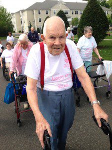 The Arbors resident Harvey, who did five laps around the green to raise funds to fight breast cancer.  (Photo submitted)