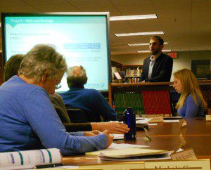 Scott Backer and Michael Zimmer of Ameresco gave a presentation on solar panels for Gateway to school committee members and staff last night. (Photo by Amy Porter)