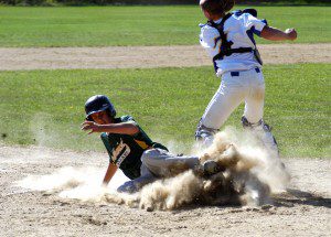 Southwick's Bob Hamel slides safely into home plate in a game against Gateway Monday in Huntington. It was one of several runs scored by both teams. (Photo by Chris Putz)