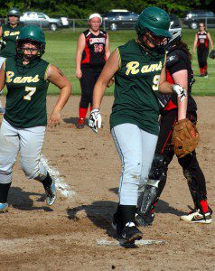 Southwick's Katelyn Sylvia crosses home plate for the game-winning run, courtesy of Emily Petit's bases-loaded walk in the bottom of the seventh inning. The Rams won the playoff thriller over the Mount Greylock Mounties 1-0. (Photo by Chris Putz)