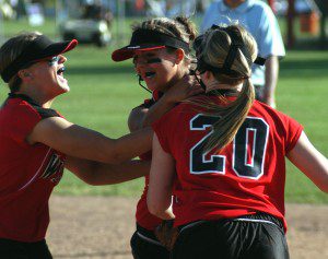 Westfield High School softball players celebrate a 3-2 win over Agawam Friday. (Photo by Chris Putz)