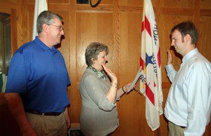 Left to right, At-large City Councilor Dave Flaherty,  Assistant City Clerk Gordonna Roy and Ward 2 City Councilor Brian Winters, being sworn in.  (Photo  by Don Wielgus)  