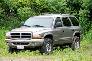 A Holyoke man has been arrested after he allegedly repeatedly accepted deposits for a 1999 Dodge Durango (above) from several different buyers but delivered the vehicle, which does not belong to him,  to none of them. (Photo by Carl E. Hartdegen) 