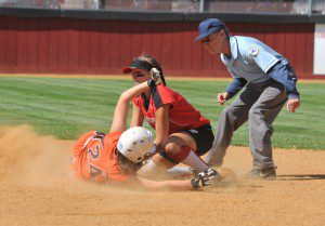 Westfield second baseman Sydney Ezold makes the out on Agawam's Mary Reidy during the 10th inning. (Photo by Frederick Gore)