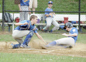 Gateway catcher Tyler Heeter, left, tags out Southampton's Eric Trotman. (Photo by Frederick Gore)