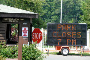 Signs posted at the entrance to Hampton Ponds State Park wold seem to make it clear when the park is closed to visitors. (Photo by Carl E. Hartdegen)