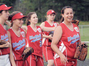 Westfield Senior League All-Star Mahlia Reyes, right, smiles to the crowd after Westfield won 27-8 in a mercy-ruled game over Quaboag. (Photo by Frederick Gore)