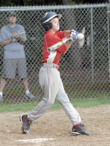 Westfield Little League All-Star Major short stop Jimmy Hagan connects during last nights game against Agawam. (Photo by Frederick Gore)