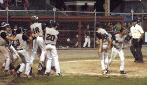 The Westfield 13-Year-Old All-Stars celebrate a state championship comeback Wednesday night against Pittsfield at Bullens Field. (Photo by Chris Putz)