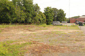 The Planning Board this week unanimously approved plans to build a 2,400 square-foot animal control facility behind the Southwick Police station where the former DPW carriage house was located. (Photo by Frederick Gore)