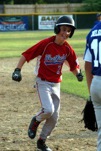 Westfield North 12-Year-Old All-Stars' Mike Nihill rounds the bases after blasting a solo home run in the fifth inning to tie the sectional game at 5-5 Thursday night in Leominster. (Photo by Chris Putz)