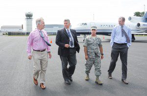 Congressman Richard E. Neal, left, tours Barnes Regional Airport with Brian Barnes, second from left, airport manager, Col. Peter Green, of the 104th Barnes Fighter Wing, and Westfield Community Development Director Peter J. Miller, right, after a press conference at the airport this month. Neal was instrumental in helping to secure an $8.7 million grant which was funded through the a tax on the sale of aviation-grade fuel at airports. The Barnes Regional Airport runway rehabilitation project is slated to cost $21 million which will include reconstruction of Runway 2-20, a 9,000-foot runway, the second longest in the state. (File photo by Frederick Gore)