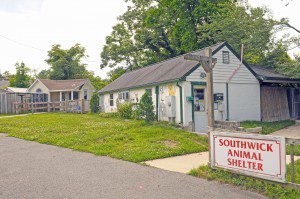 The present Southwick Animal Shelter will soon be replaced with a new 2,400-square-foot facility. Officials said the main building, foreground, will be used by the town but the cat shelter, left, and storage units will be sold. (Photo by Frederick Gore)