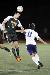 Southwick's Ryan King, left, completes the header. (File photo by Frederick Gore)