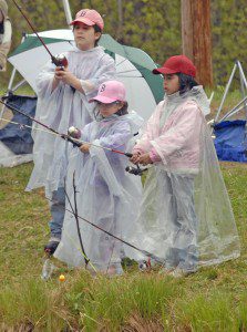 Hundreds of children gather at the Westfield Sportsmen Club pond each year to attend the annual fishing derby which is free and open to the public. (File photo by Frederick Gore)