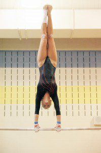 Westfield's Taryn Hamel performs her routine on the uneven bars during last night's meet at Chicopee Comp. Westfield won the dual meet 132.45 to Chicopee Comp's 128.80. (Photo by Frederick Gore)