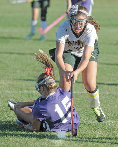 Southwick's Alyssa Kelleher, right, collides with Holyoke defender Jessica Lamagdelenine during the second half of yesterday's game in Southwick. (Photo by Frederick Gore)