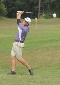 Westfield Voc-Tech's Jake Parsons eyes the drive. (Photo by Frederick Gore)