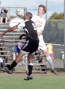Westfield forward Mike Santiniello, left, gets the header against Agawam's Ben Cassidy. (Photo by Frederick Gore)