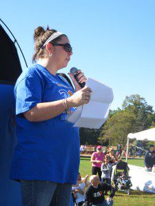 Sam Walas of Team Monson Strong was one of several speakers during the opening ceremony of Walk Now For Autism Speaks Western New England, held at Stanley Park Sept. 28. More than 1,000 people walked to raise funds and awareness. (Photo by Hope E. Tremblay)