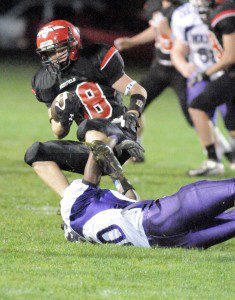 Westfield's Garrett Fitzgerald intercepts a Holyoke pass during Friday night's game under the lights of Bullens Field. (Photo by Frederick Gore) 
