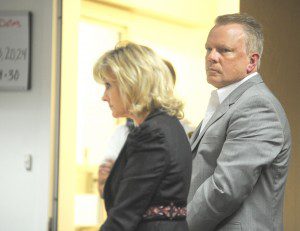 Blandford selectman Robert R. Nichols and his attorney listen to Judge Rita S. Koenigs during a violation of probation hearing Thursday in Westfield District Court. (Photo by Carl E. Hartdegen)