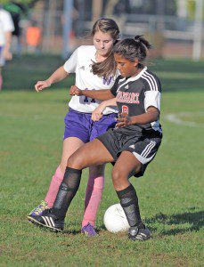 Westfield Voc-Tech's Ashlee Lees, rear, battles a Renaissance player for possession of the ball during a recent regular season contest. Lees scored two goals to help lead the Tigers to victory Tuesday against PVCS. (Photo by Frederick Gore)