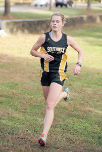 Southwick's Emily McKinney crosses the finish line with a time of 20:59 against St. Mary at Stanley Park, Tuesday. (Photo by Frederick Gore)