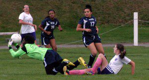 Hampden County School of Science comes up with a defensive stop against Westfield Voc-Tech Wednesday at Bullens Field. (Photo by Chris Putz)